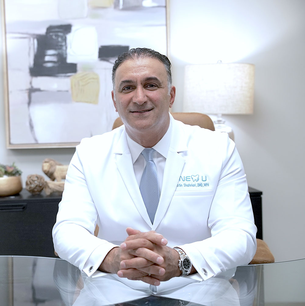 Dr. Abtin Shahriari seated in his office